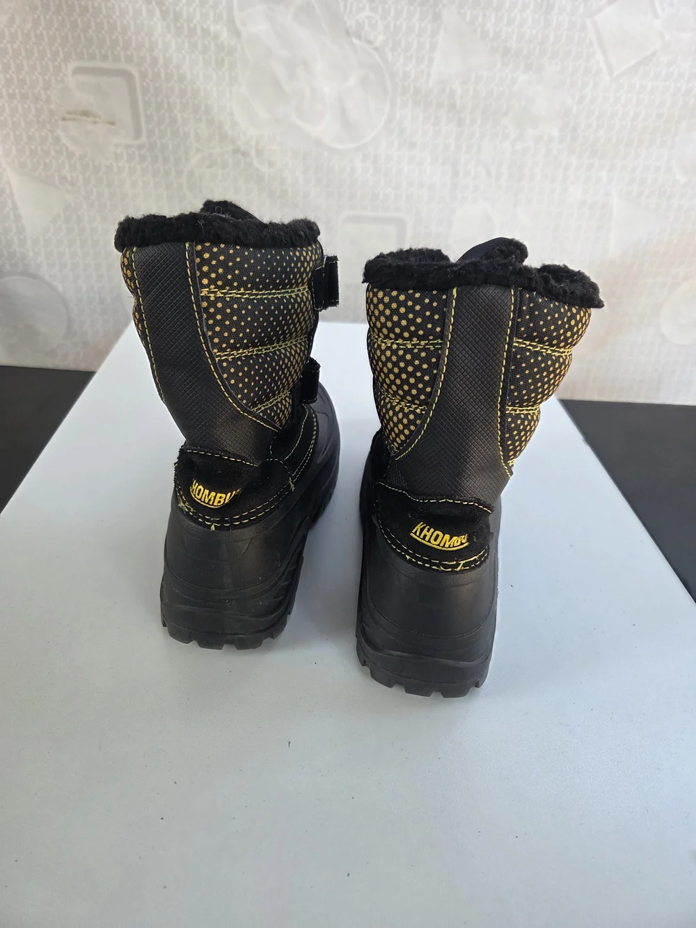 Khombu Kids Black Snow Boots with Yellow Stitching
